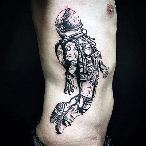 Float into Space with a Stunning Astronaut Tattoo Design